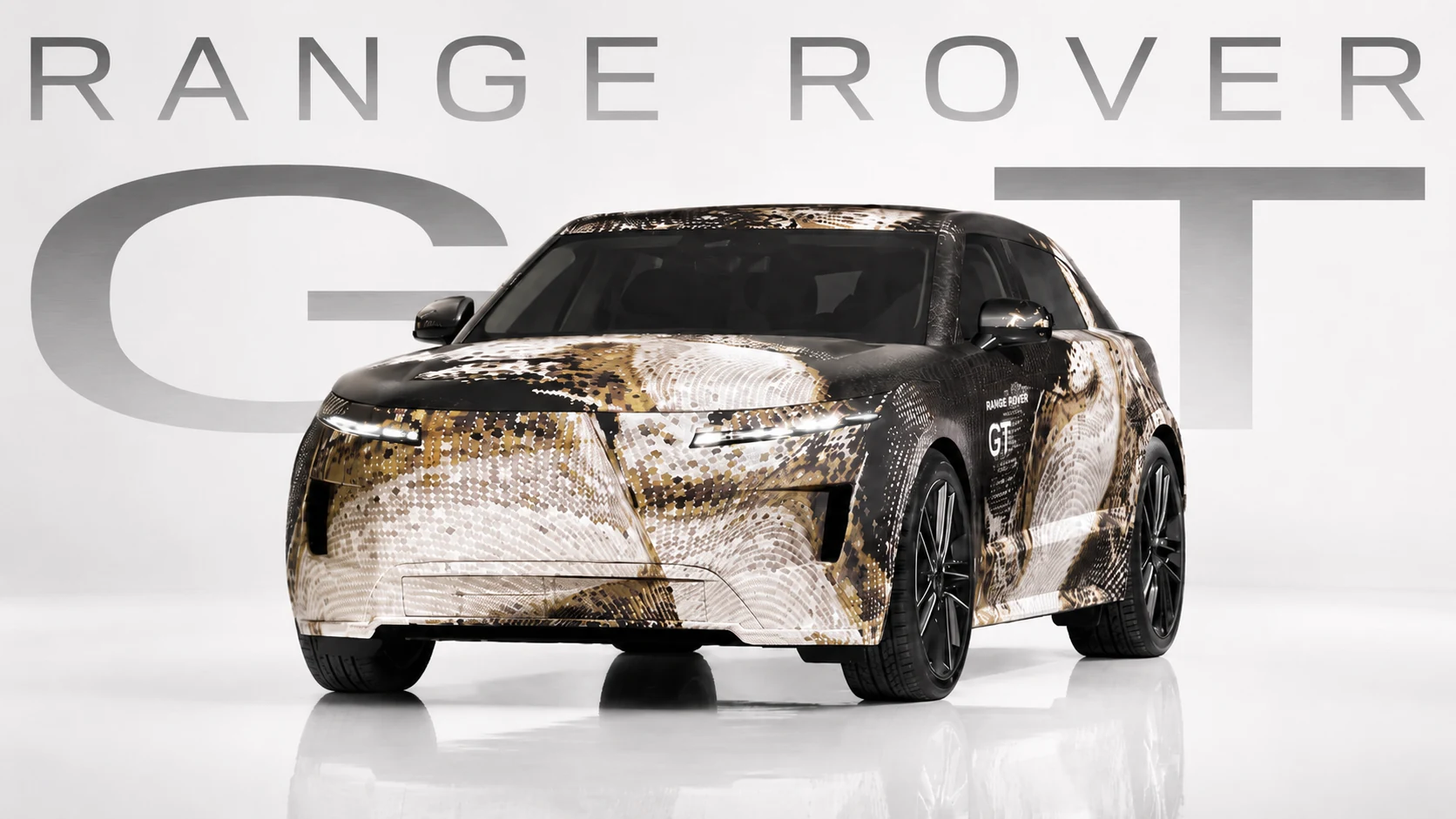 Camouflaged Range Rover GT prototype photographed in a bright white studio