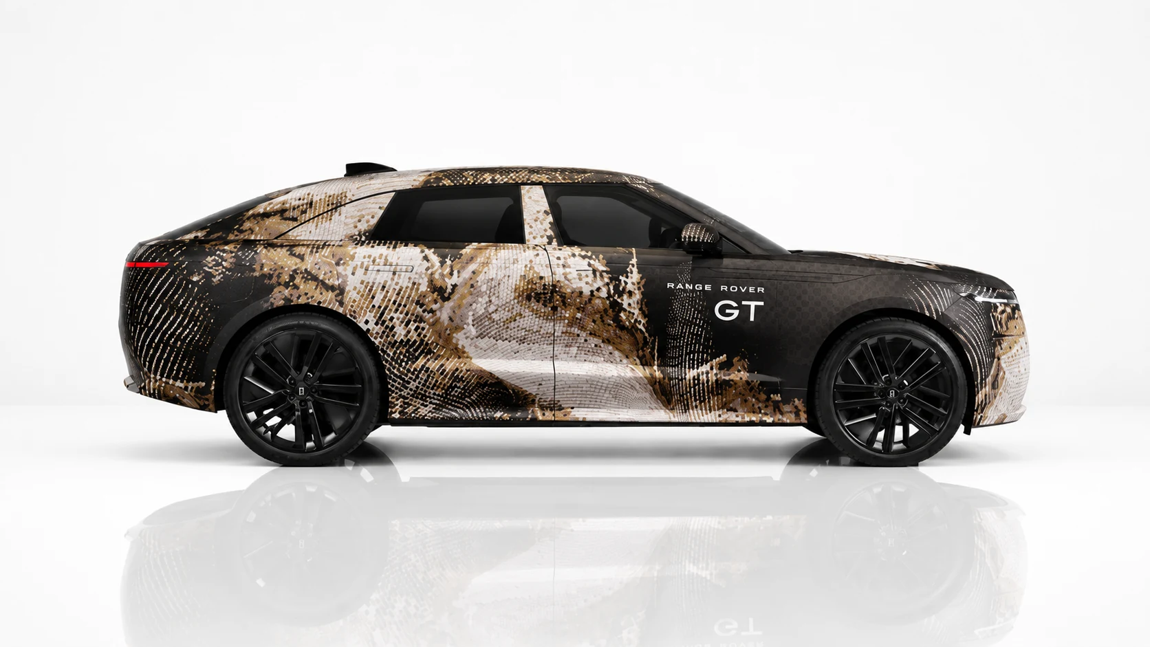 Full side profile of the camouflaged Range Rover GT prototype